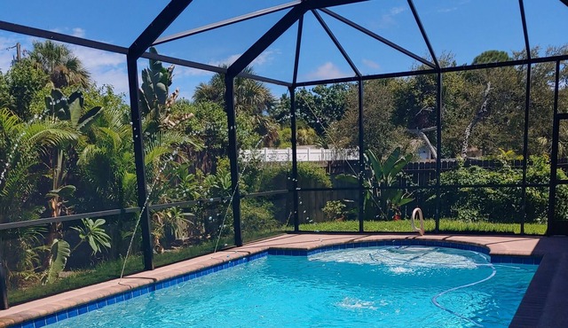 Master bedroom suite with pool. Eight minutes to beaches.