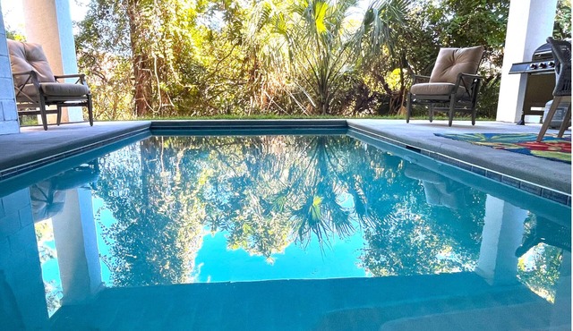 New Home! Free Heated Pool, Short Stroll to Beach