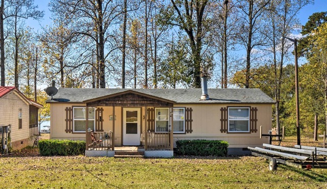 NEW! Lakefront Townville Cottage w/ Boat Dock!