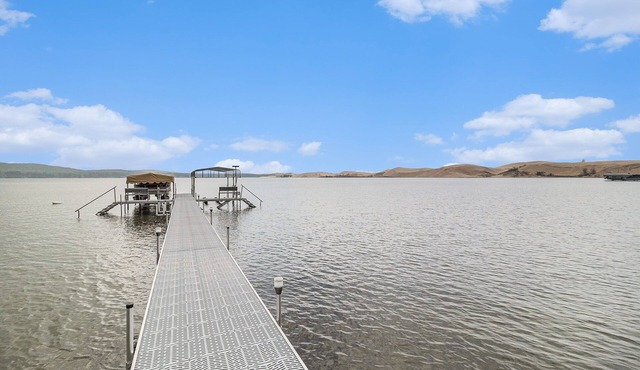 NEW LISTING: Beautiful cottage on the shores of Silver Lake with stunning water & dune views. in Mears