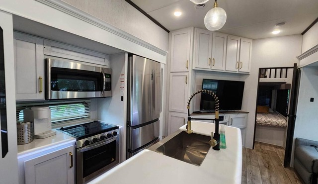 NEW! Trendy RV Rental at River Ranch w/Golf Cart 189