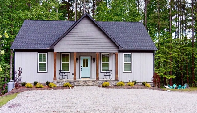Newer property at Kerr Lake with dock! Family-sized with game room and lg porch!