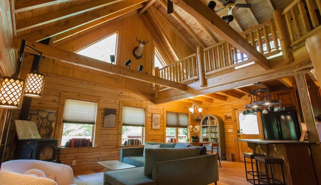 Riverfront Log Cabin with Treetop Views near Dahlonega- Hot Tub, Firepits, more! in Dawsonville