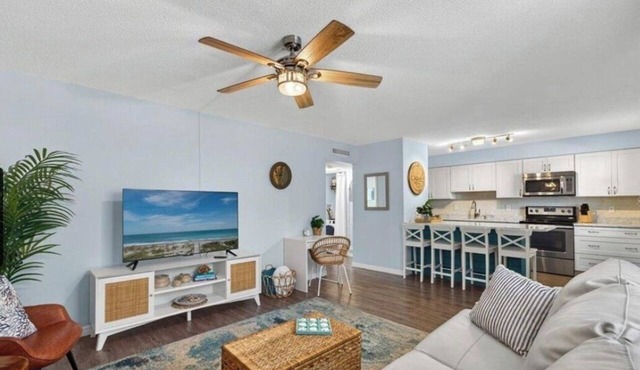Rocket View & 5 minute Walk to the Beach - Immaculate, Remodeled Condo with Pool