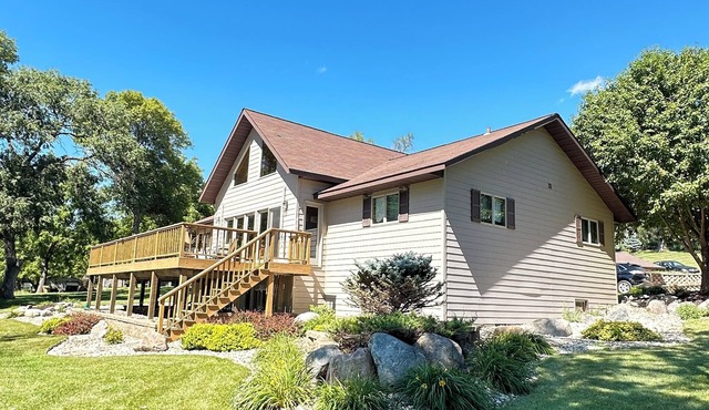 Spacious home with a large deck and ample space for beautiful sunset viewing! in Ortonville