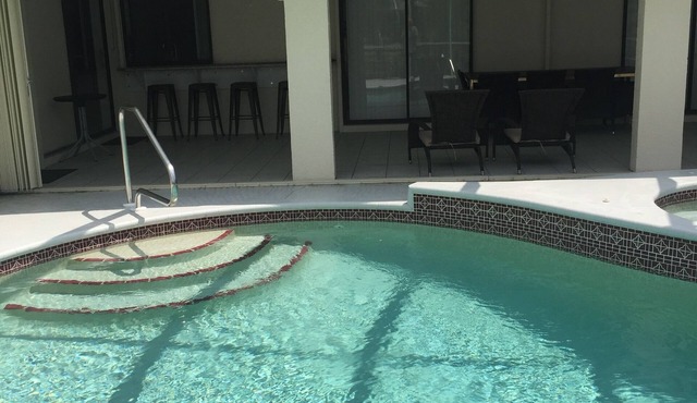 Sunshine Canal with an in ground pool