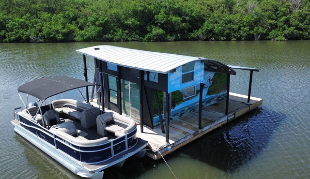 The Burrow, an amazing floating cabin with pontoon rental available