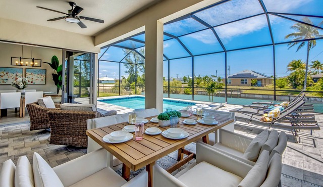 Villa Paradise - Exquisite 3 Bedroom/3 bath waterfront Villa with heated pool, guest suite, fishing poles