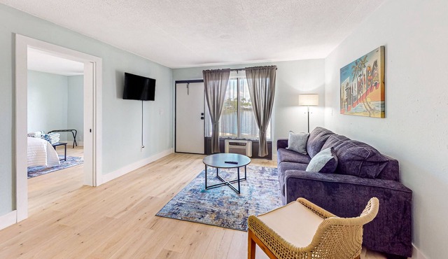 Water-view Marco Island condo with firepit, grill, dock & W/D access