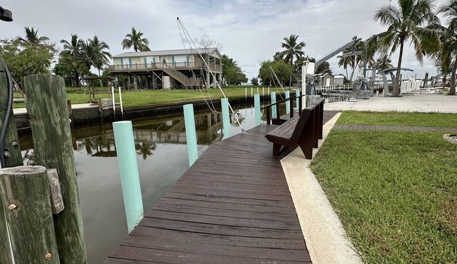 Waterfront Everglades basecamp with dock, trailer parking, and direct bay access