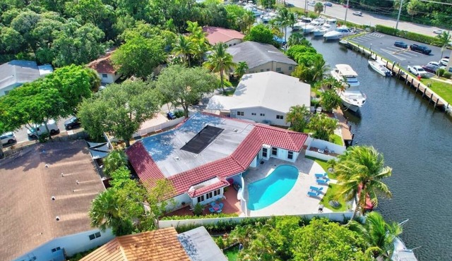 Waterfront Haven! 4BR/2.5BA + Solar Heated Pool