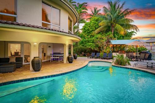 Waterfront Retreat: 7BR Villa with Pool Firepit