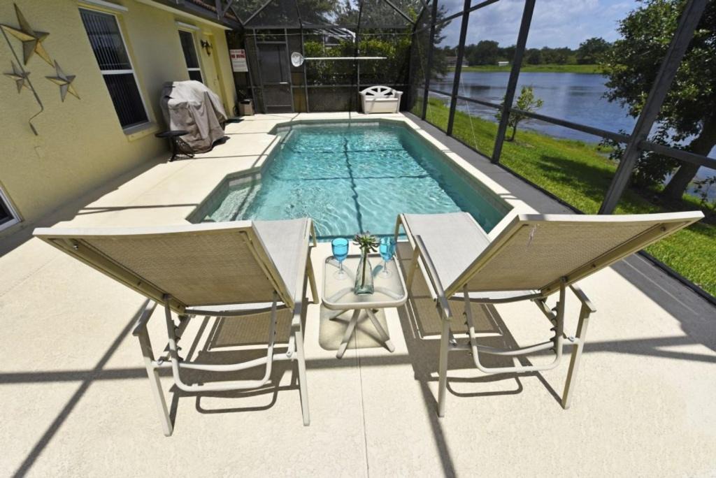 Buena Ventura Lakes House | Lovely Lakeside 4-Bed Pool Home At Villa Sol-3125 Home