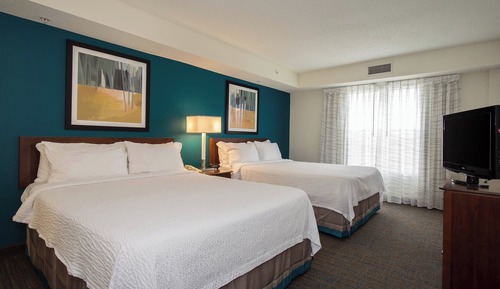 Suite, 2 Queen beds with a Sofa bed