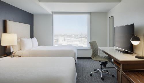 Queen Room with Two Queen Beds, Roll-In Shower and City View - Mobility and Hearing Accessible
