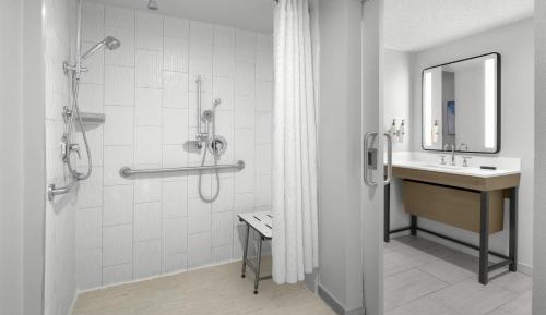 One-Bedroom Suite with Two Double Beds and Roll-In Shower - Mobility Accessible Bed