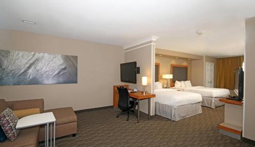 Queen Suite with Two Queen Beds, Roll-In Shower and Trundle Sofa - Mobility Access