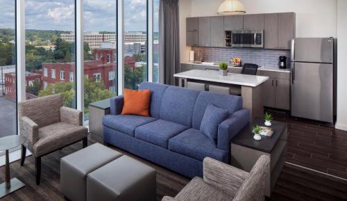 Two-Bedroom Suite One King Bed, Two Queen Beds, Sofa Bed and Kitchen